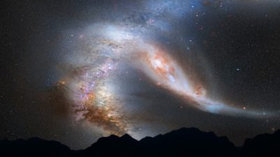 Himlen, och på den syns en stor galax i form av ett bälte med punkter som lyser.