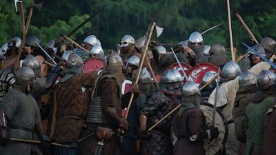 Människor utklädda till vikingar som låtsaskrigar.